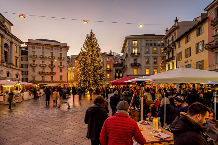 Christmas in Switzerland: a market and Christmas tree in Lugano.